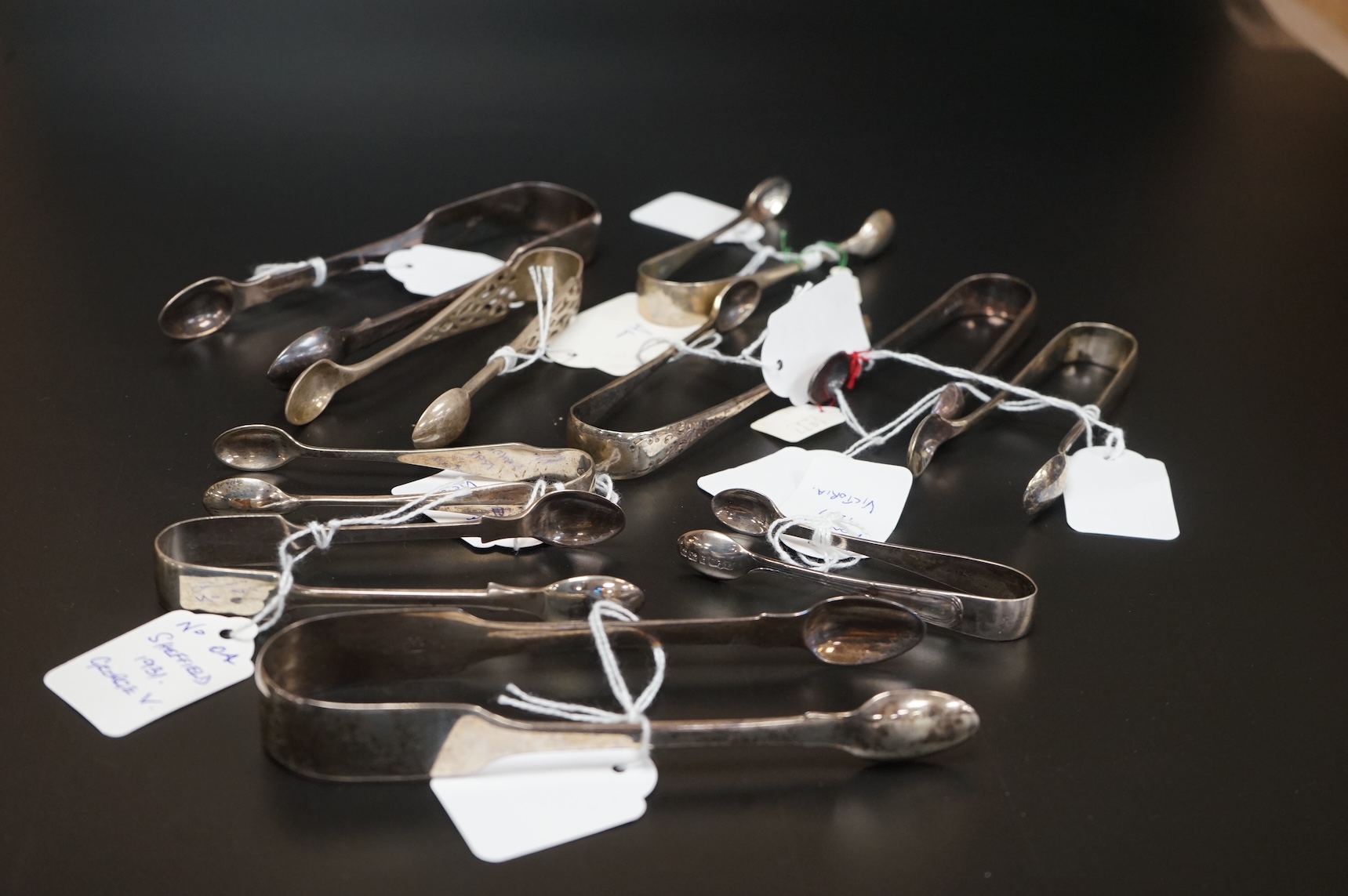 Ten assorted pairs of mainly 19th century silver sugar tongs, earliest pair by Jonathan Hayne, London, 1821.